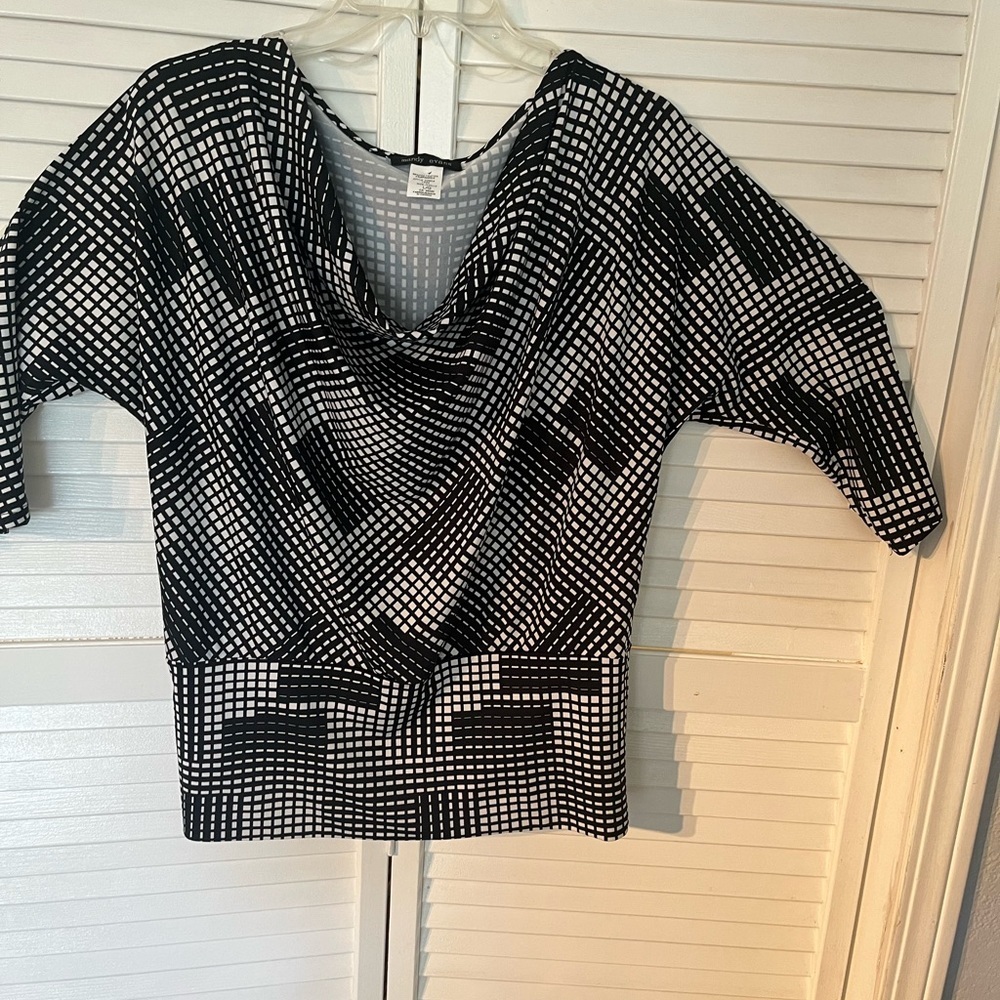 Sharp black and white blouse​